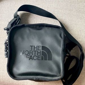 The North Face black crossbody purse